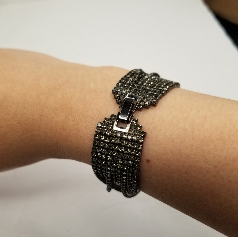 MULTILAYERED BLACK WITH CRYSTALS BRACELET.